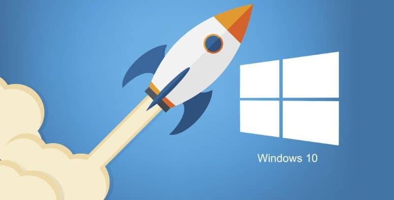 illustrazione del razzo con l'icona di Windows 10 su sfondo blu