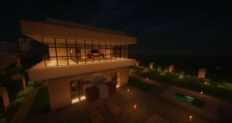 casa di minecraft di notte con luci
